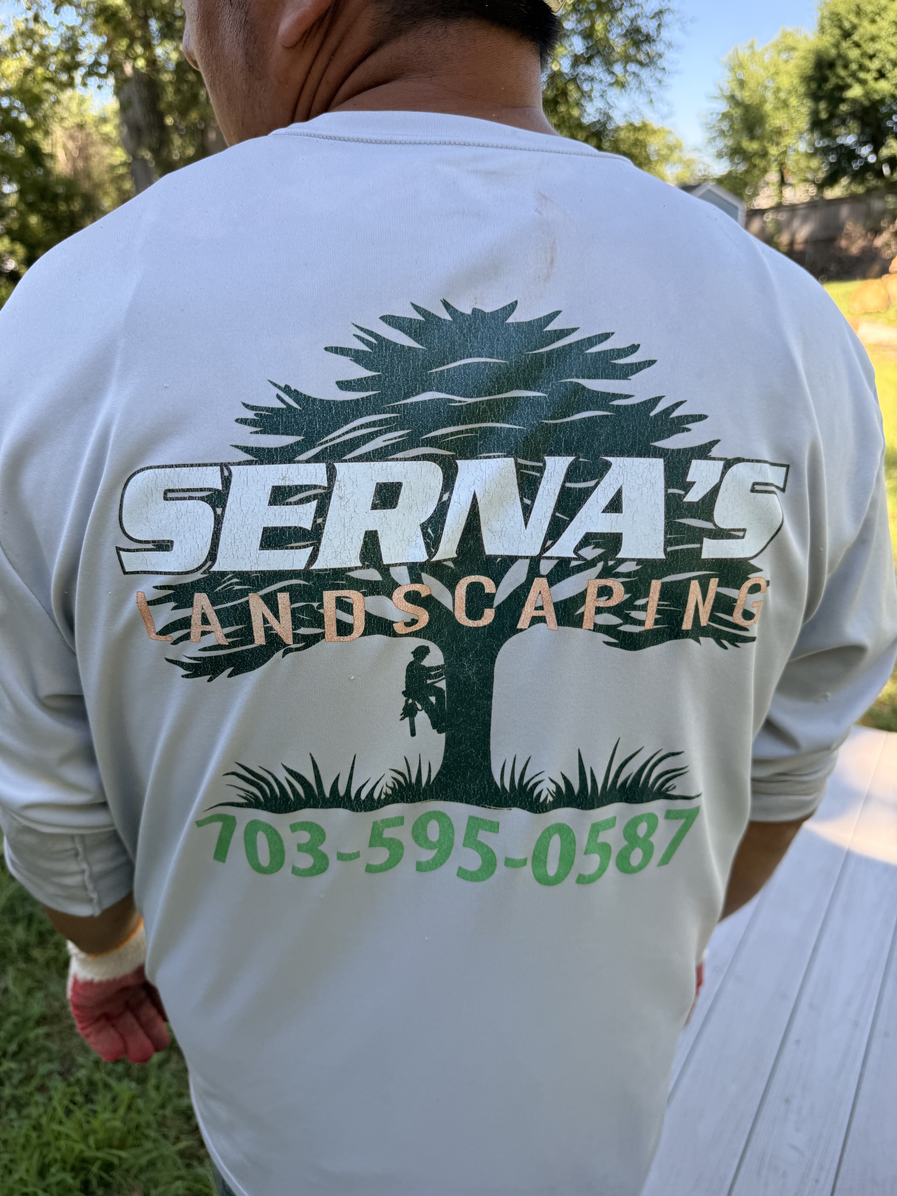 Serna's Landscaping shirt with phone number